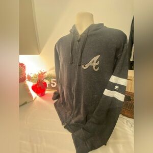 Majestic Black Zip-Up Sweater with White Accents